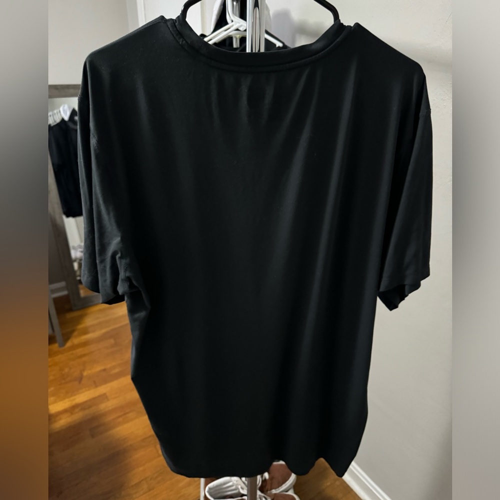 Size L Mountain Hardwear wicking t-shirt.